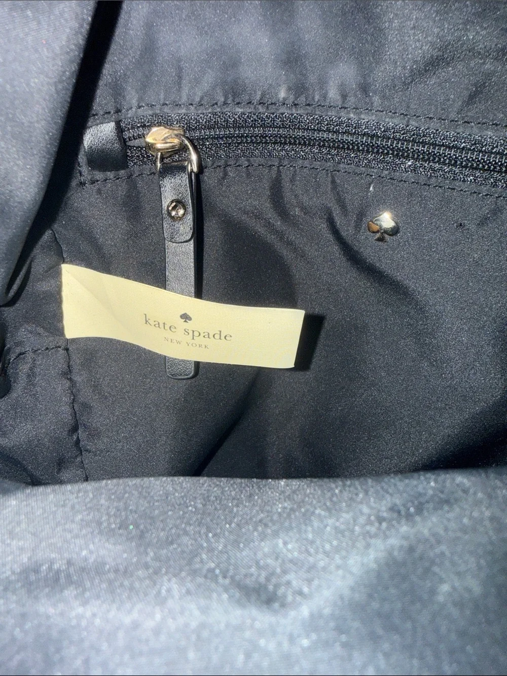 Kate Spade: black mini nylon backpack with gold hardware